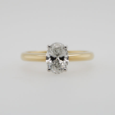 Oval Cut Diamond and Yellow Gold Claw Set Ring