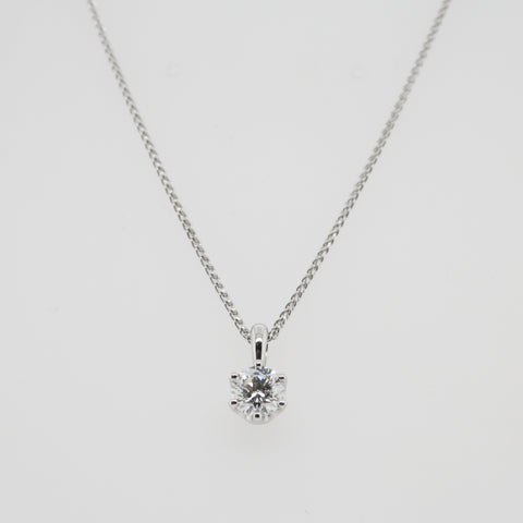 Claw set diamond pendant in White Gold
