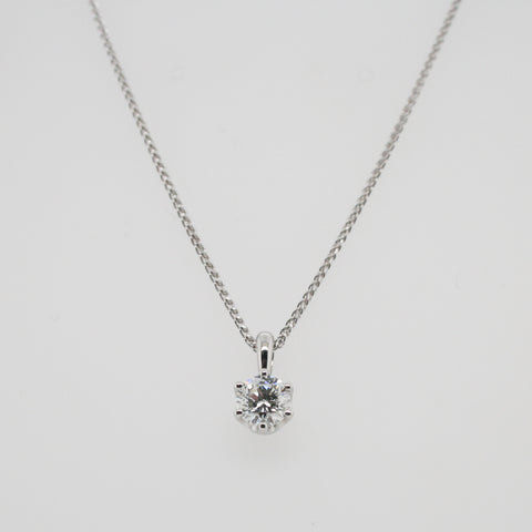 Claw set diamond pendant in White Gold