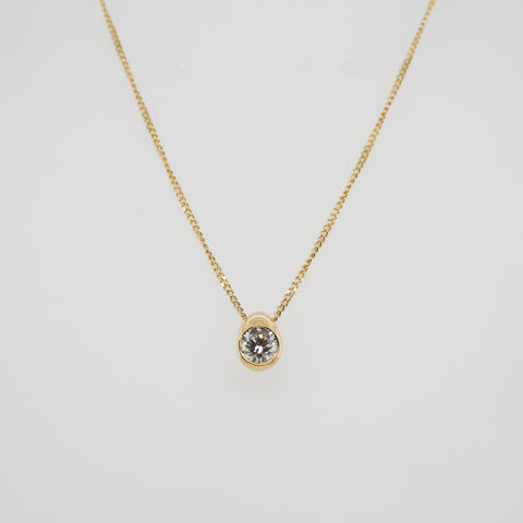 Yellow gold diamond rub over set pendant
