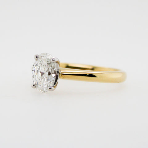 Oval Cut Diamond and Yellow Gold Claw Set Ring
